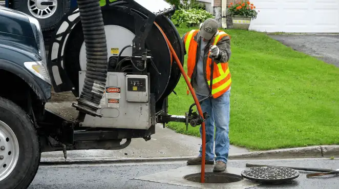 Technician using specialized drainage equipment for sewer line cleaning and foundation protection in Anaheim, CA