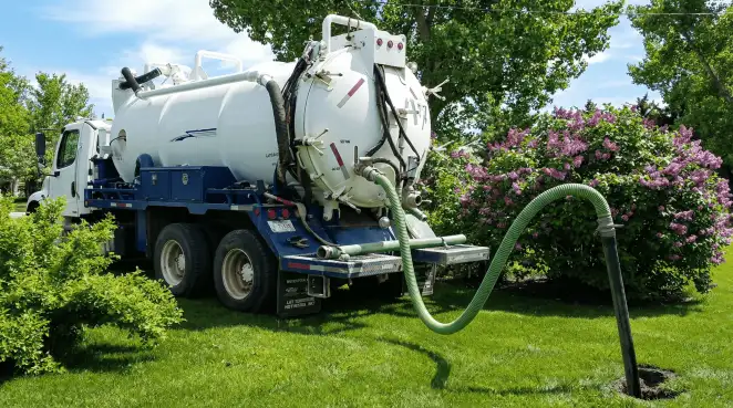 Professional vacuum truck performing residential drainage and septic maintenance in Anaheim, CA